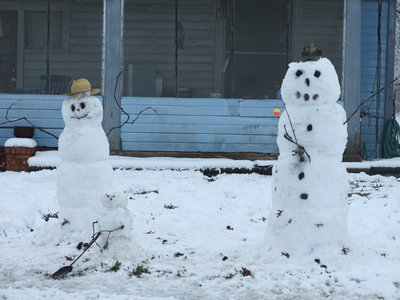 Image: The fishing family — Dad is ready to go fishing and son makes way for them all.