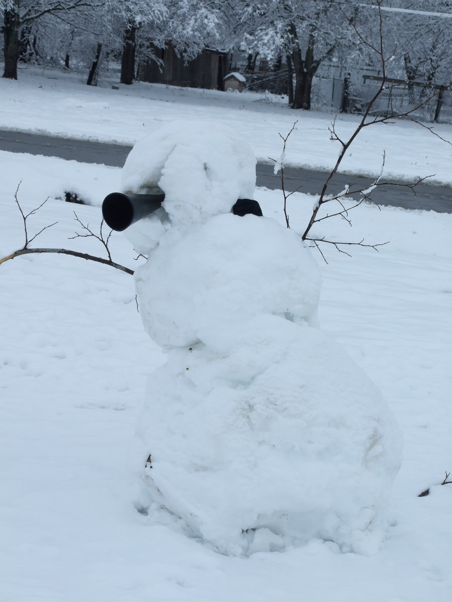 Image: Cheerleader Snowman — This cheerleader can be see around Mt. Goliad Church.  See the megaphone?
