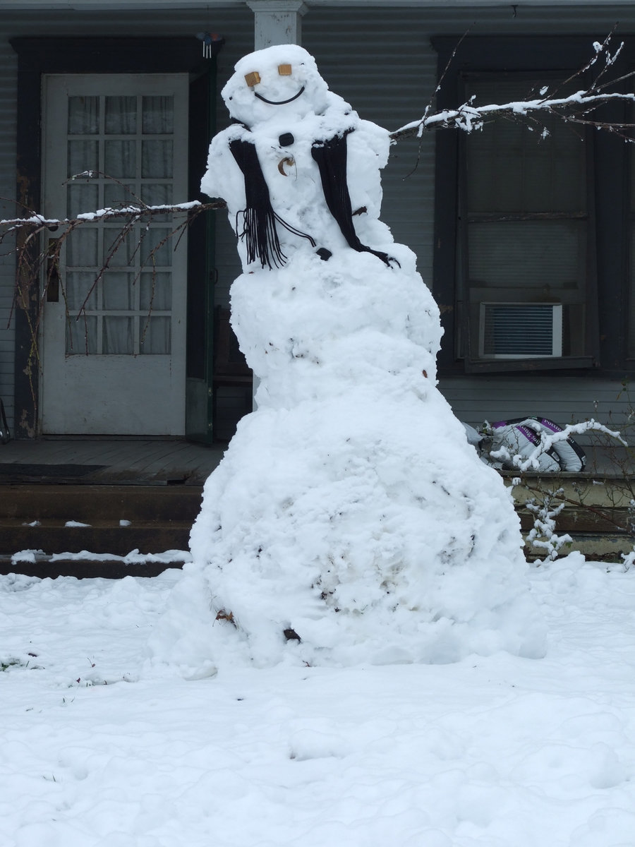 Image: Warm Snowman — His muffler keeps his neck warm and toasty.  If he gets hungry, the graham cracker eyes will come in handy.