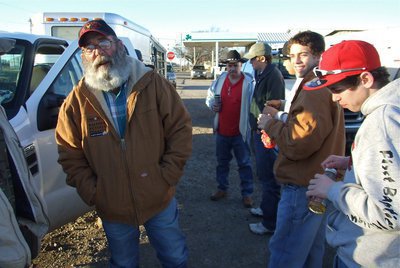Image: Parents get involved — Mark Souder, on the left, pitches in to help ensure his son Brandon Souder, second from the right, and the Italy FFA have a successful experience.