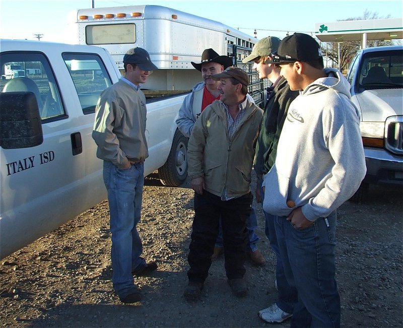 Image: Larry gets ’em smiling — Italy School Board Member Larry Eubank gets the fellas excited about the trip.