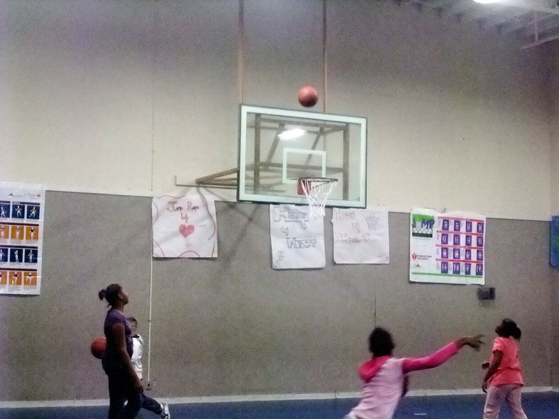 Image: Up in the air — More basketball players, participating in Hoops for Heart.