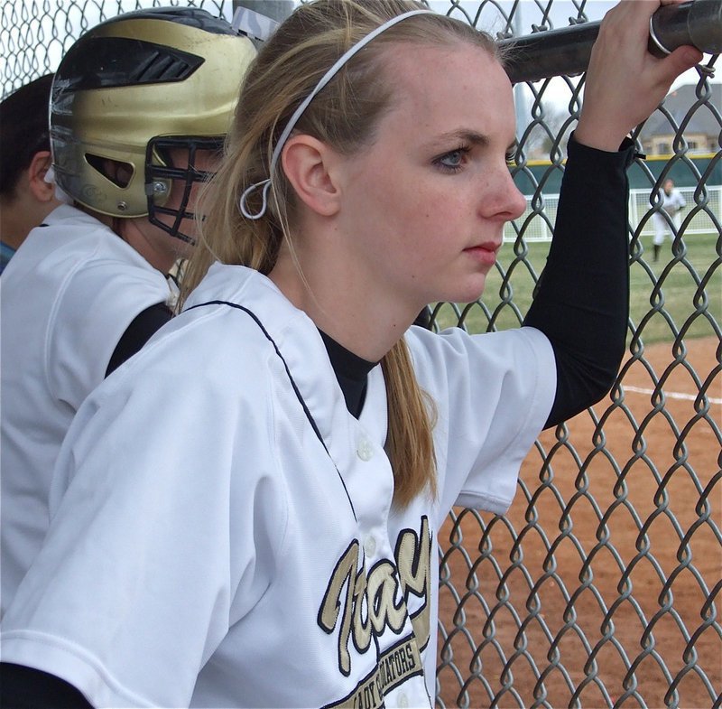 Image: Abby Griffith — Abby Griffith(3) checks out the action at home plate.