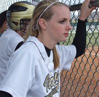 Image: Abby Griffith — Abby Griffith(3) checks out the action at home plate.
