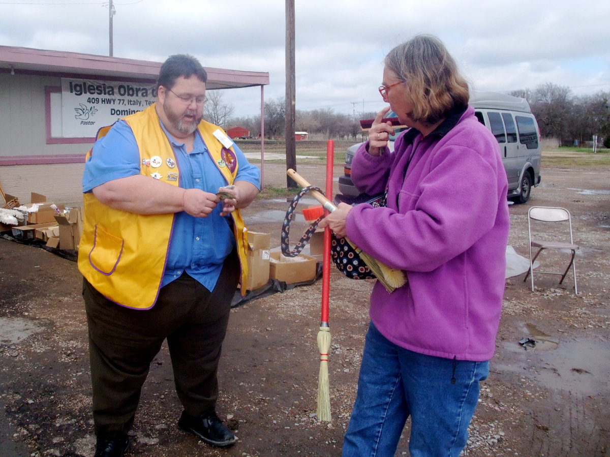 Image: Arvel Gowin &amp; another customer — This customer was still making up her mind if she wanted to buy some more.