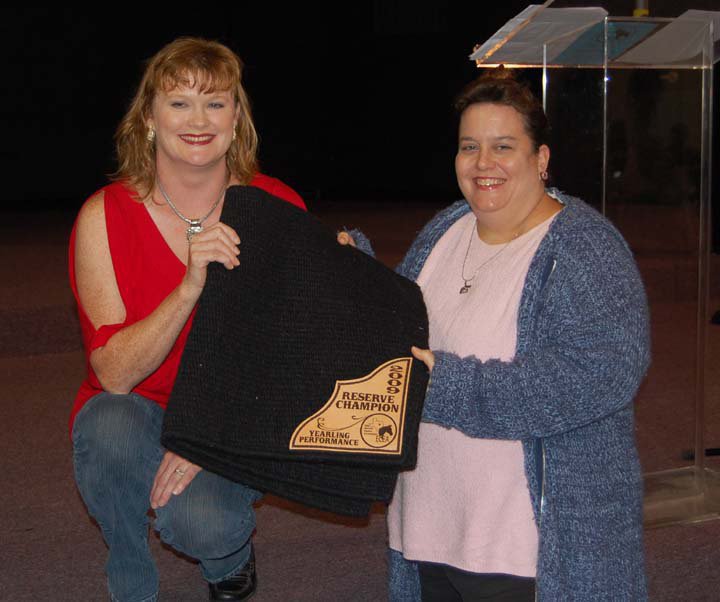 Image: Julie Hinz — Julie Hinz, left, of Italy showed the Reserve Champion Yearling Performance Horse.