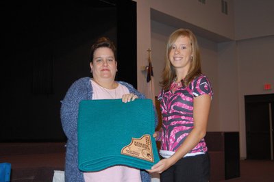 Image: Courtney Griffith — Courtney Griffith, right, of Midlothian was the Reserve Champion English and Western 12to18. Griffith trains at the Flying Dollar Ranch in Italy.