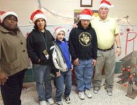 Image: The Winners! — Mrs. Davis, Morgan, Nathon, Blake and Mr. Destafani stand in “their” hallway.