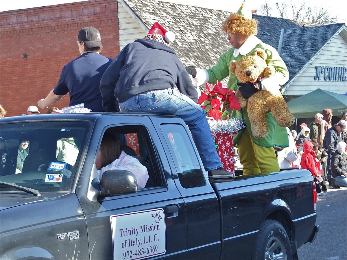 Image: Trinity Mission — Trinity Mission of Italy, L.L.C. clowns around during the parade.