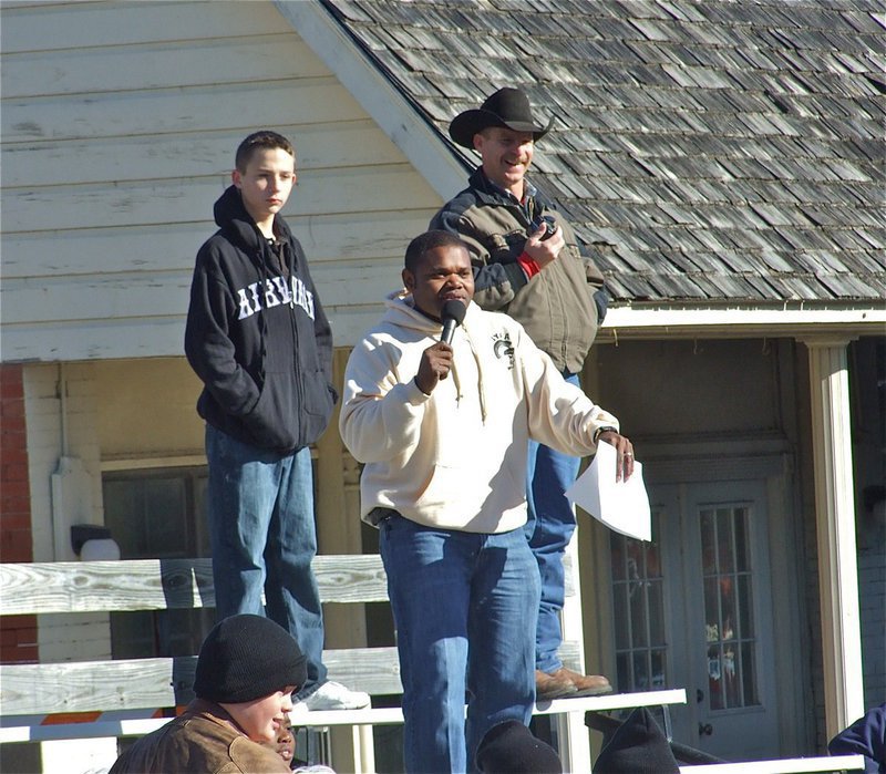 Image: Mr. Microphone — Bryant Cockran brought excitement and enthusiasm to the Christmas parade as he introduced each float individually.