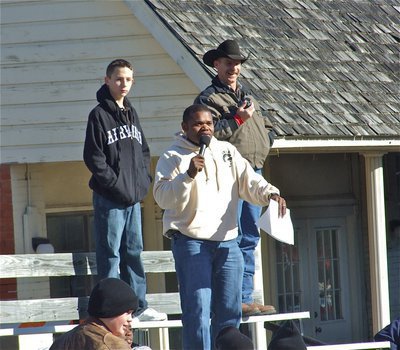 Image: Mr. Microphone — Bryant Cockran brought excitement and enthusiasm to the Christmas parade as he introduced each float individually.