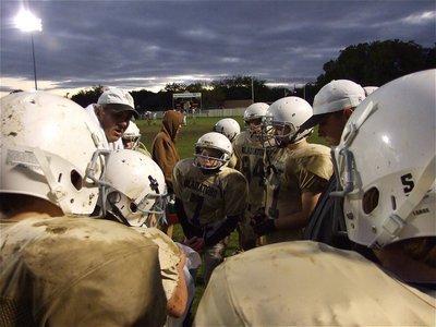 Image: Needing a bright spot — Coach Coleman tries to rally the team after trailing the entire game.