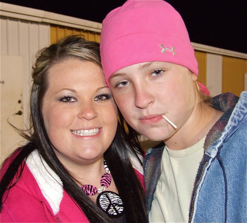 Image: Faces in the crowd — Lauren and Jaclynn ham it up after the game.
