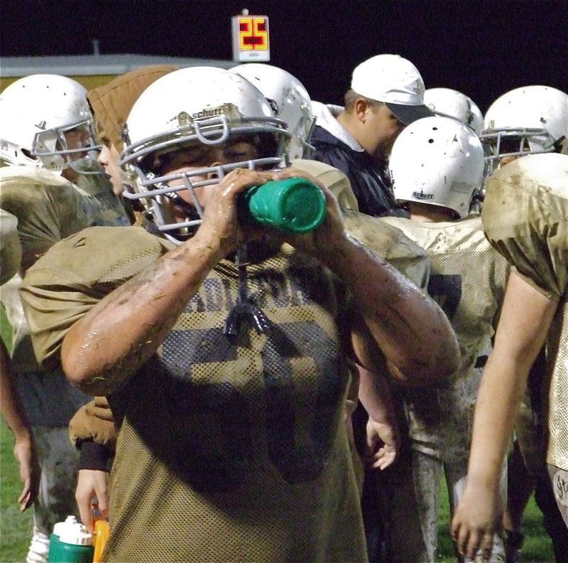 Image: Gulp! Gulp! — Zain Byers tries to get hydrated.