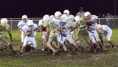 Image: Opportunistic play — Linebacker Bailey Walton(48) spots the loosely held football, rips it away fom Wortham and then gets tackled as he crosses the goal line 45-yards later.