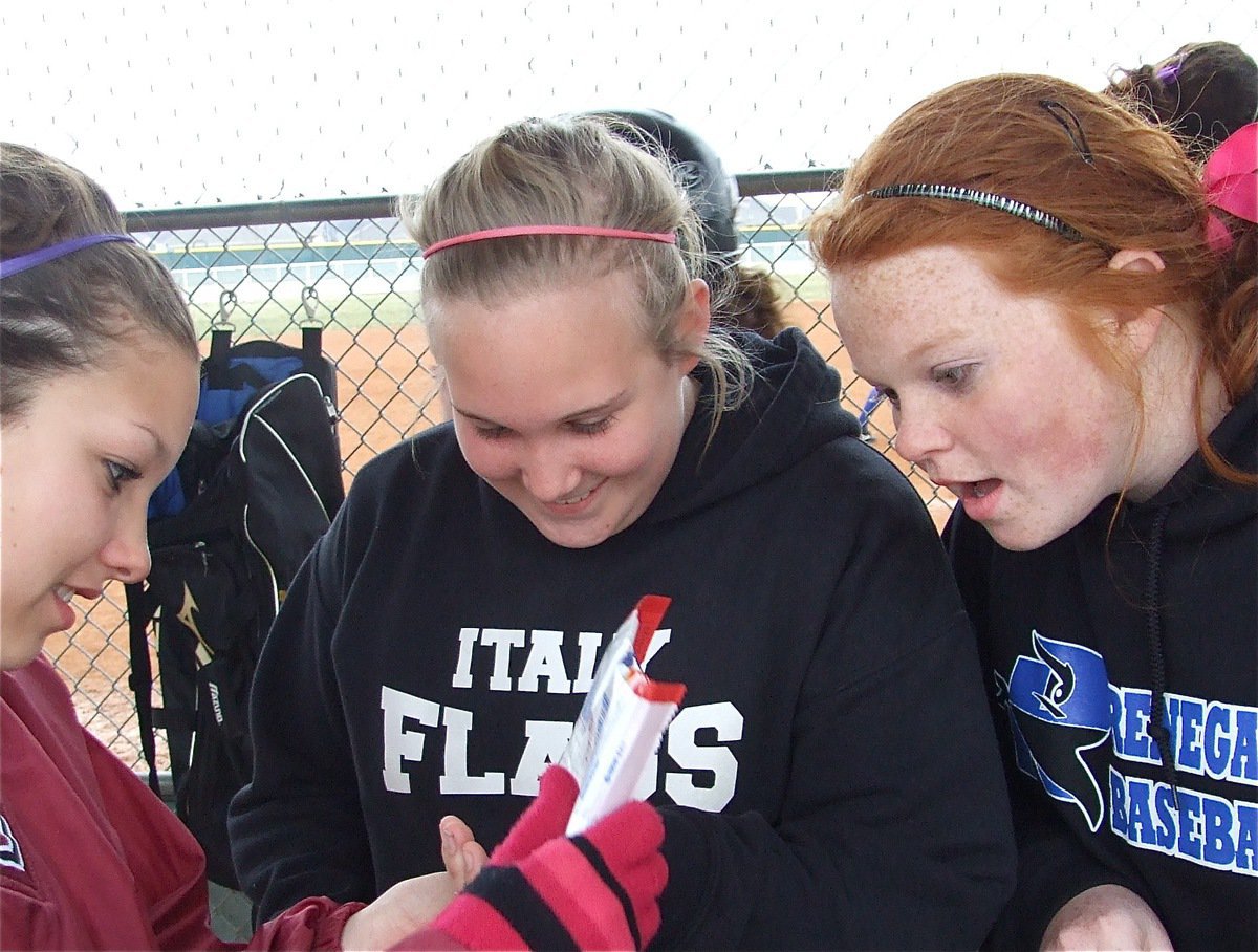 Image: Sunflower seeds! — Morgan Cockerham, Drenda Burk and Katie Byers divvied up the sunflower seeds.