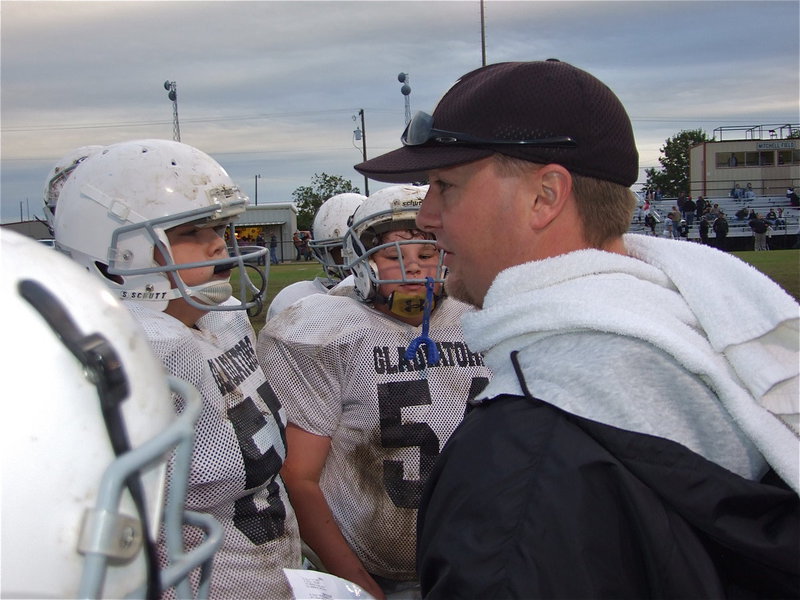 Image: “Let’s try a pass.” — Coach Josh Ward instructs the Junior High team.