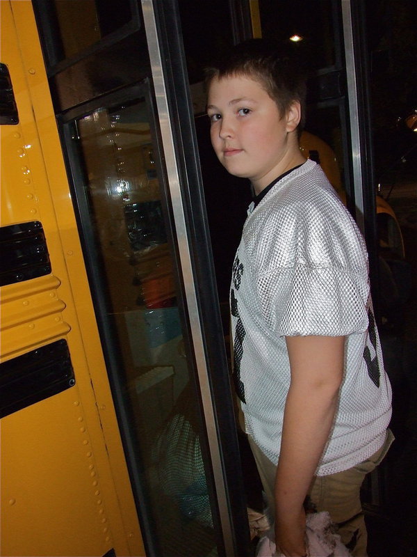 Image: All aboard! — Tristan and his teammates board the bus back to Italy.