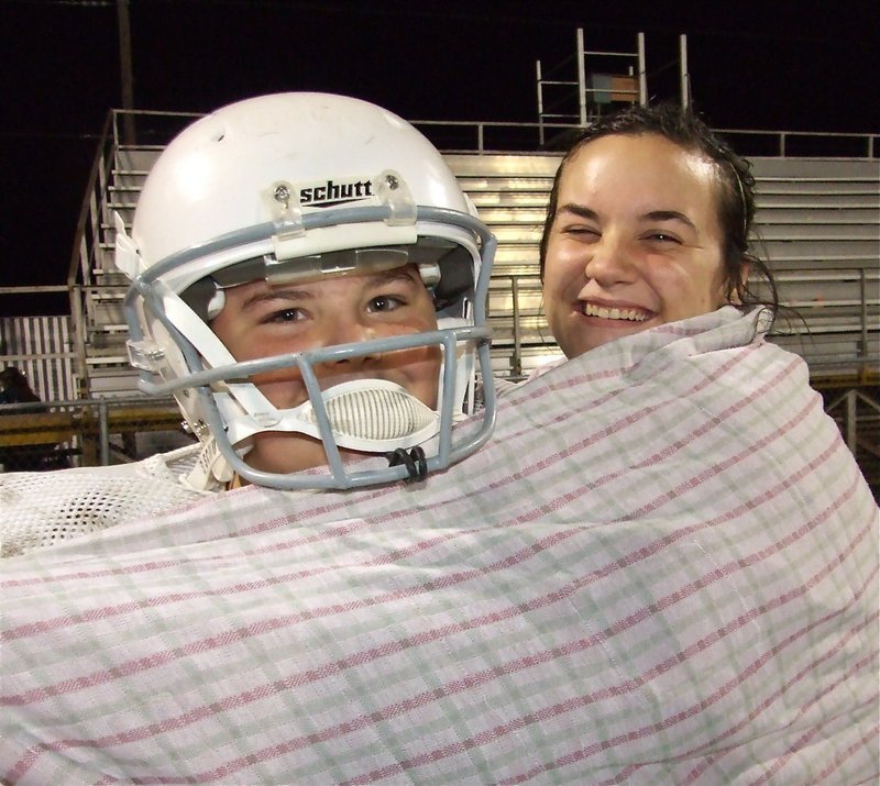 Image: Double-K — Kaytlyn Bales hugs her bro, Kelton Bales, after the big win over Hubbard.