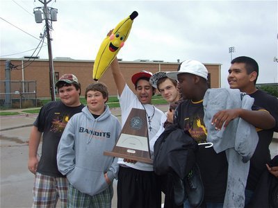Image: Going bananas — Members of the Gladiator Regiment Band go bananas after their big win.
