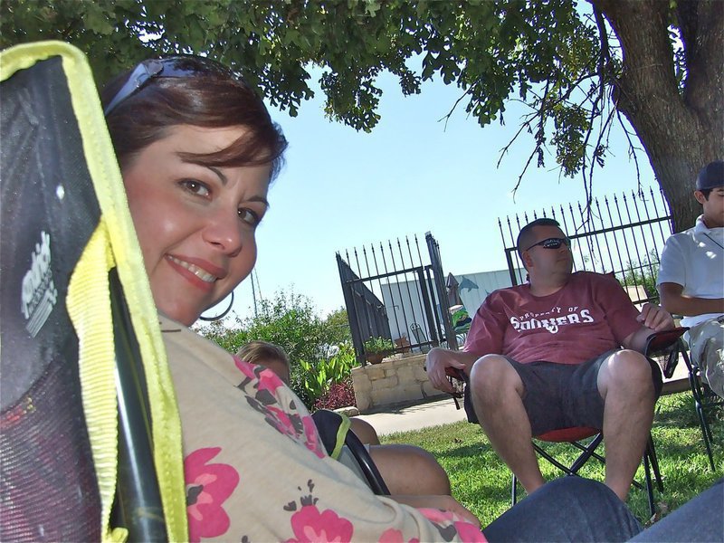 Image: Fun with old friends — Tina Darrell-Campbell sits across from Eric Peters during Saturday’s get together.