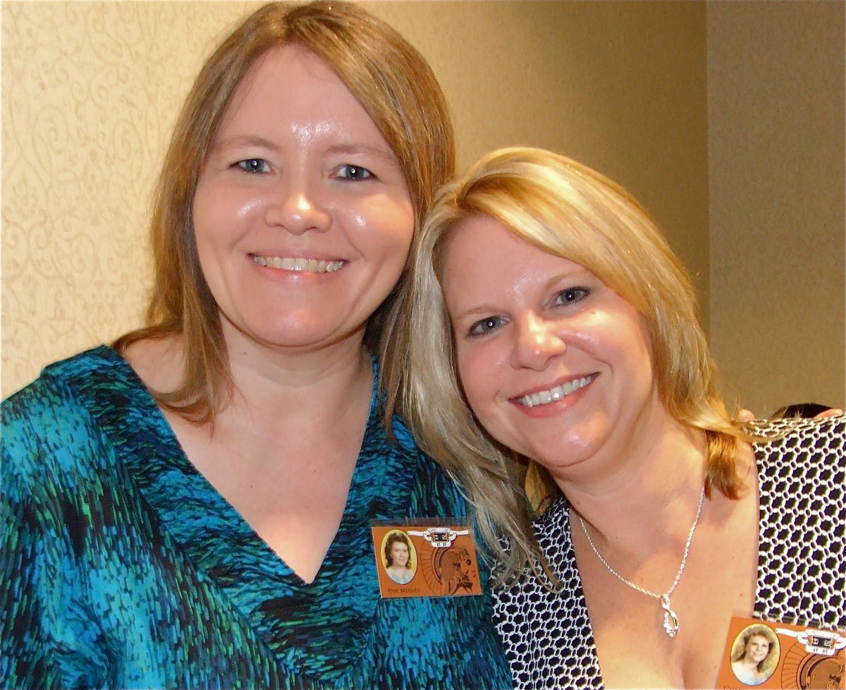 Image: Old pals — Pam Mosley and Cheryl Finch-Hiller hug and pose for the camera, during the reunion dinner.