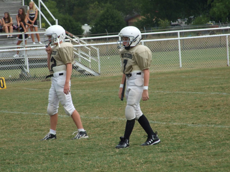Image: Boyd and Escamilla — Cody Boyd (32) and John Escamilla (7) represent the last line of defense at their safety positions.