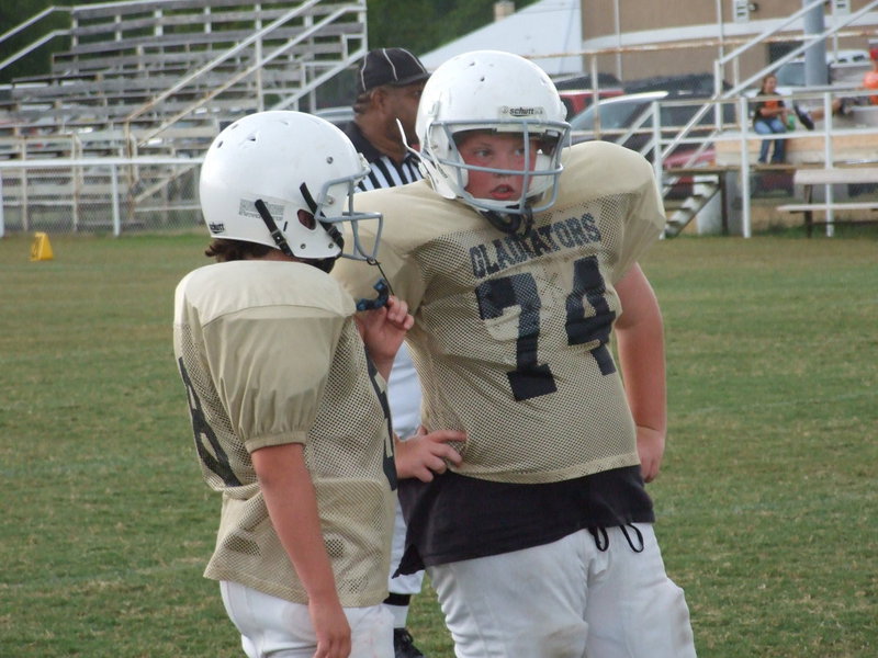 Image: Kyle and James — You hit him high and I’ll hit him low.