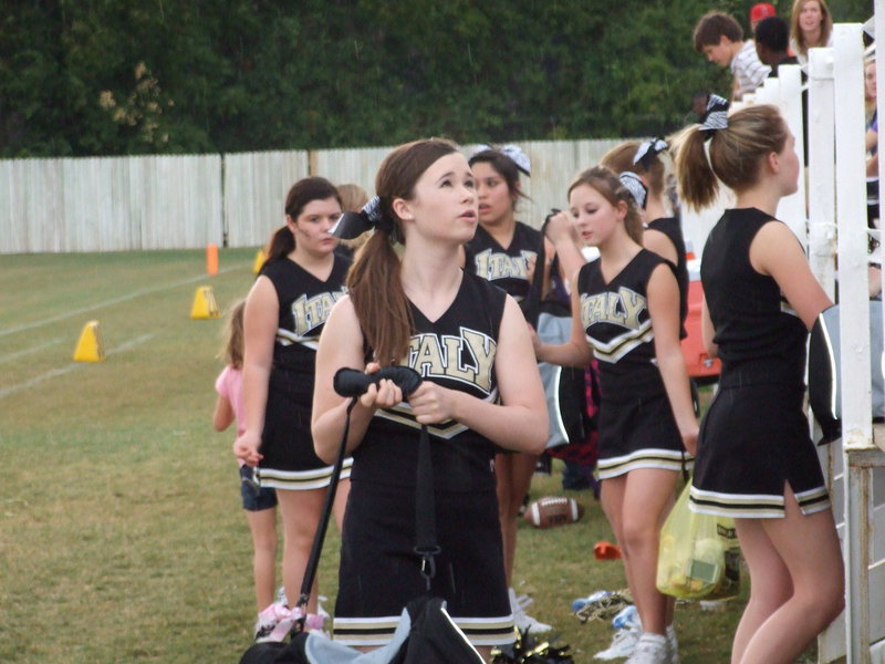 Image: We’re outta here! — Rain drops keep falling on my pom-poms.