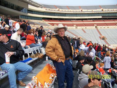Image: David looks anxious — Daniel’s dad, David Seay, is a bit wrestless just before the kickoff between Aledo and Brenham.