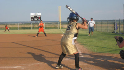 Image: Tara to hit — Tara Wallis prepares to hit one.