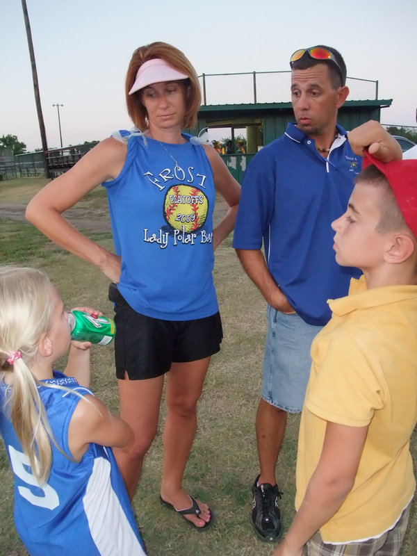 Image: The official family — Tournament Official Stephen Mott compliments his daughter Lacy on her team’s winning performance along with Mrs. Tournament Official and Trevor.