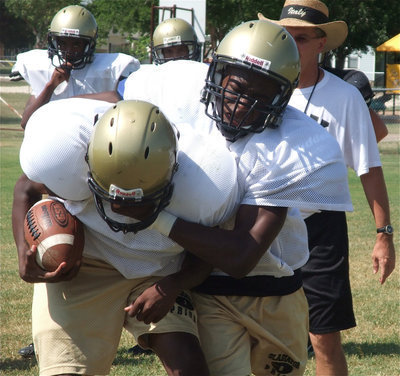 Image: Desmond delivers a blow