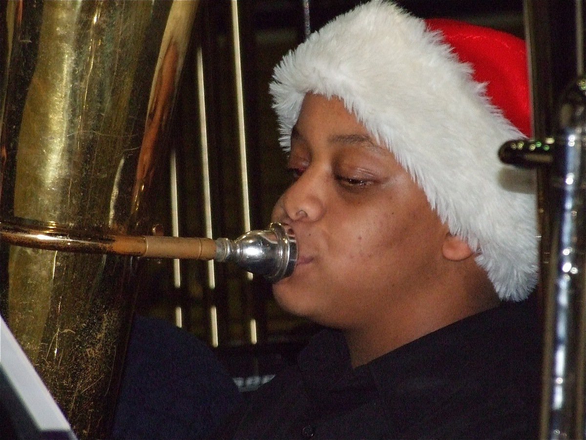Image: Tim on Tuba — Timothy Fleming and his Tuba buds keep the “Beat of Champions” playing right through the Holidays.