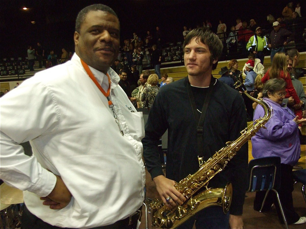 Image: Billy &amp; Ronald — Billy Burkhalter, a former Italy Band member himself, talks shop with senior Ronald Helms.