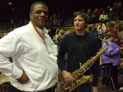 Image: Billy &amp; Ronald — Billy Burkhalter, a former Italy Band member himself, talks shop with senior Ronald Helms.