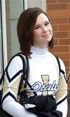 Image: Ready to cheer — Italy High School cheerleader Meagan Hooker is ready to make some noise inside the AAC in Dallas.