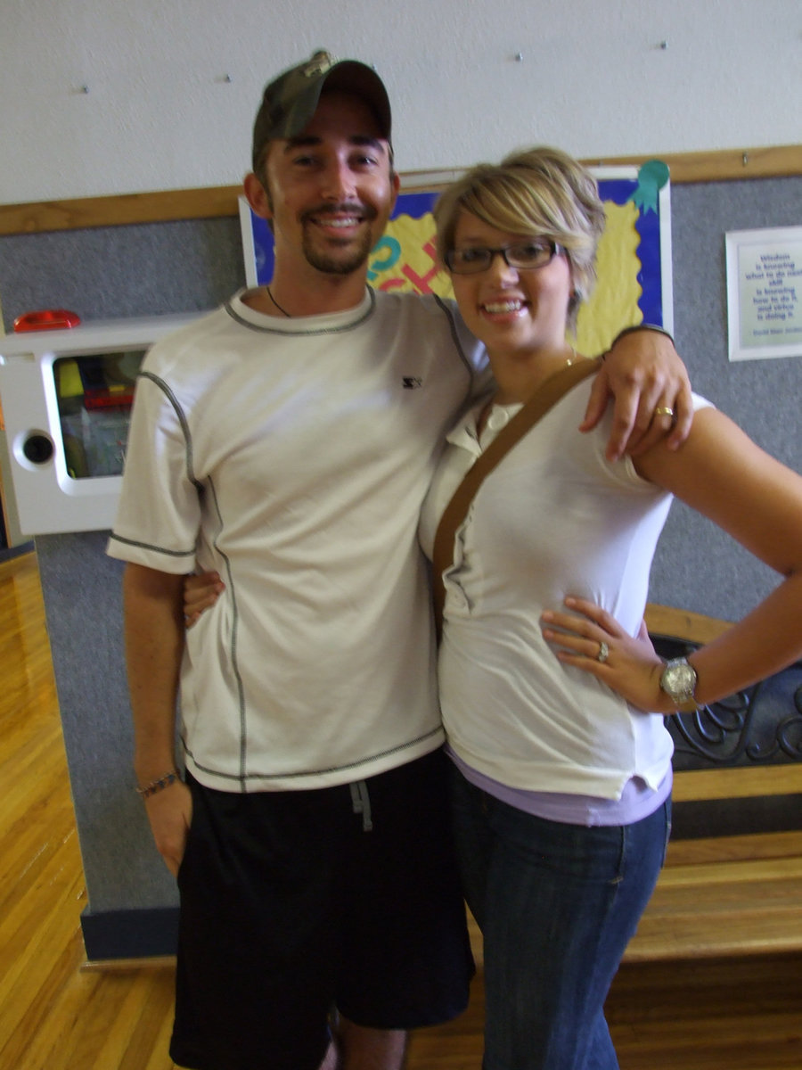 Image: Coach and Mrs. Cox — Caleb Cox and his wife of two months, Marybeth.