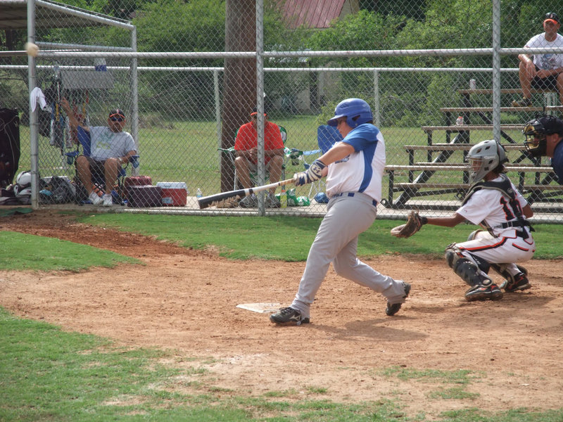 Image: John belts one