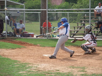 Image: John belts one