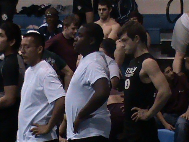 Image: Muscle men — Jacob Lopez, Adrian Reed and Chase Hamilton check out the competition.