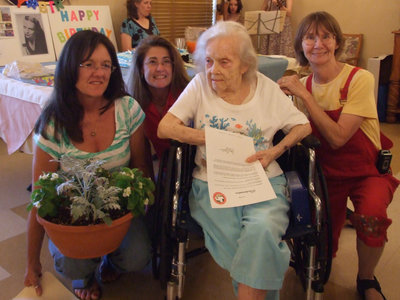 Image: You All Say Cheese — Terri Murdock, Rhonda Cockerham, June Frame and Pat Pratt smiling prettily for the camera.
