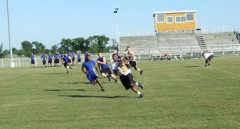 Image: Heath Clemons — Heath Clemons heads for the endzone.