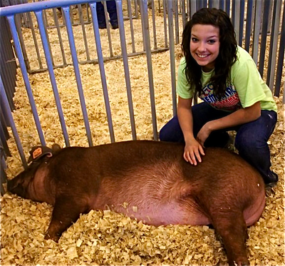 Image: That’ll do, Kinsler. — Kinsler, who managed to achieve celebrity status, takes a moment to relax with proud handler, Morgan Cockerham.