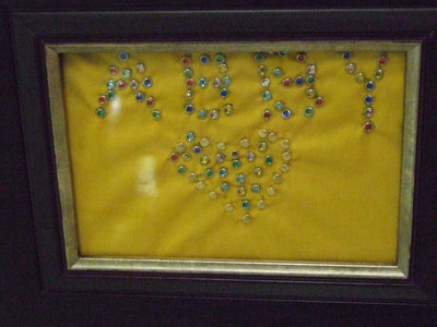 Image: One Hundred Jewels — Abby Gage created this piece of artwork with 100 jewels for her project.