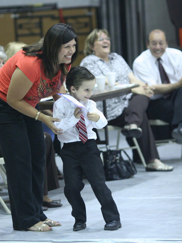 Image: Avalon’s Next Top Model — An eager student strikes a pose while receiving his award during the Avalon Elementary Awards Banquet.