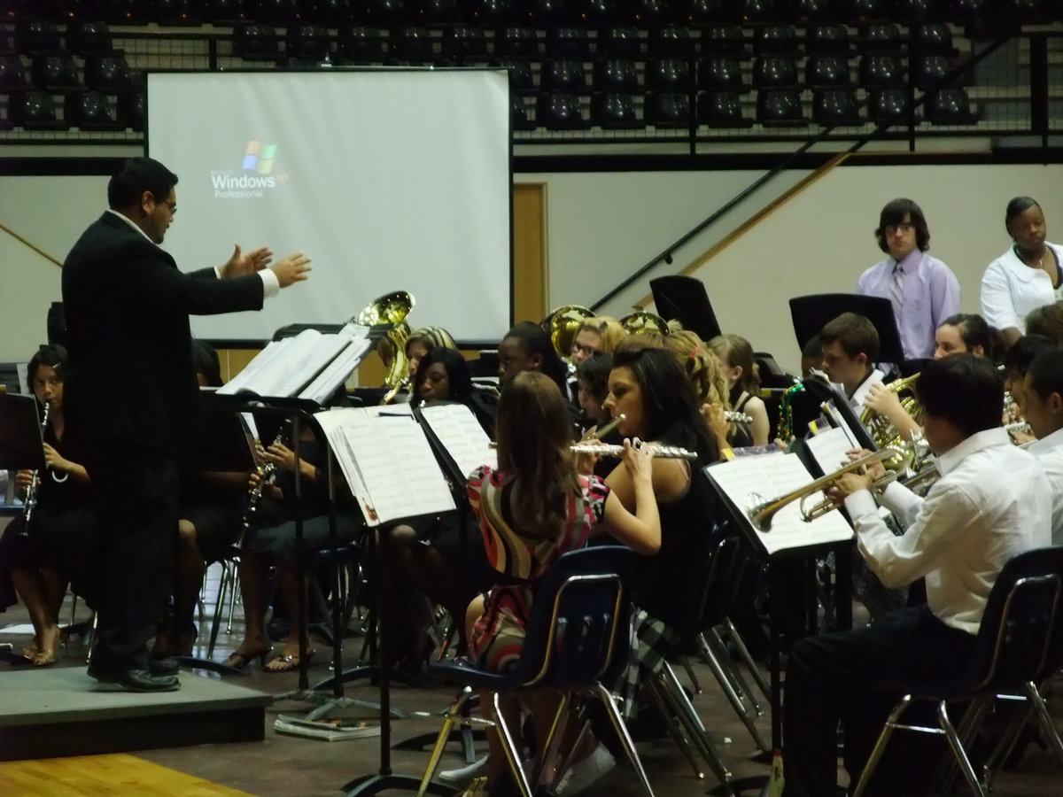 Image: Keeping time — The Seniors keep time, for one last time, with the Gladiator Regiment Band.
