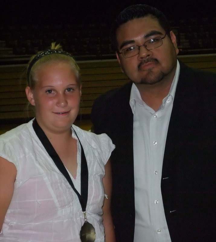 Image: Burke is honored — Drenda was selected as the top 9th grade band member.