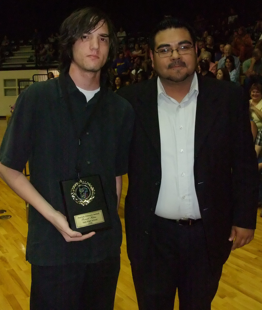 Image: Ronald Helms — Ronald Helms receives the distinguished Patrick Gilmore Award from Mr. Perez.