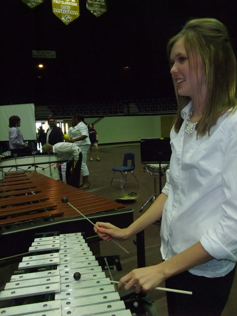 Image: Belle on the the bells — Gladiator Regiment Band member, Kaitlyn Rossa, plays beautiful music on the bells during the spring concert.